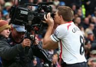 MANCHESTER, ENGLAND - MARCH 16: Steven Gerrard of Liverpool celebrates scoring the second goal by kissing the steadicam during the Barclays Premier League match between Manchester United and Liverpool at Old Trafford on March 16, 2014 in Manchester, England. (Photo by Alex Livesey/Getty Images)